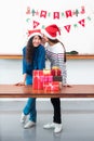 Asia girl friends wear santa hat in Christmas and new year party Royalty Free Stock Photo