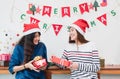 Asia girl friends wear santa hat in merry christmas and new year Royalty Free Stock Photo