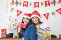 Asia girl friends wear santa hat in merry christmas and new year Royalty Free Stock Photo