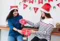 Asia girl friends wear santa hat in merry christmas party and ex Royalty Free Stock Photo