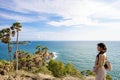 Asia Girl looking to Seascape of Phuket Best View Point Sunset