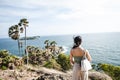 Asia Girl looking to Seascape of Phuket Best View Point Sunset Royalty Free Stock Photo