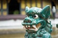 Asia green creature like lion - dragon statue, it`s big eye, nos