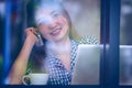 Asia happy woman talking phone in cafe and enjoying coffee Royalty Free Stock Photo