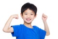 Asia little boy flexing biceps Royalty Free Stock Photo