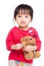 Asia little girl with her doll Royalty Free Stock Photo