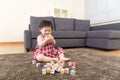 Asia little girl play wooden toy block Royalty Free Stock Photo