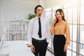 asia man and beautiful asian woman working call center operator with headset in office or workplace Royalty Free Stock Photo