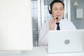 asia man working call center operator with headset in office or workplace Royalty Free Stock Photo