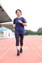 Asia middle age women jogging