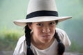 Asia 10s long black hair girl wearing white hat in summer lake blue green water background