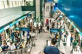 Subway train commuters waiting for train to arrive on a busy weekend in MRT station, in Royalty Free Stock Photo