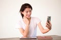 Asia thai china student university beautiful girl using her smart phone Selfie. Royalty Free Stock Photo