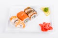 Asia. Tokyo rolls with shrimp, eel and salmon on a white plate o