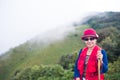 Asia trekker woman in red