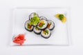 Asia. Vegetarian vegetable rolls on a white plate on a white background