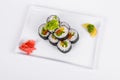 Asia. Vegetarian vegetable rolls on a white plate on a white background