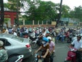 Asia Vietnam ho chi minh city road congestion chaos motorcyclist motorbike motorcycle scooters traffic jam busy intersection