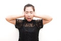 Asia woman annoying and covering ears with her hands. Royalty Free Stock Photo