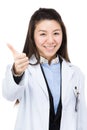 Asia woman doctor thumb up Royalty Free Stock Photo