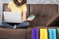 Asia woman shopping online at home. Seaching product in shopping website and pay by credit card. Royalty Free Stock Photo