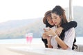 Asia woman traveling for relaxation and drinking wine on speed boat at Thailand. Royalty Free Stock Photo