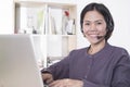 Asia women happy smiling customer support operator with headset Royalty Free Stock Photo