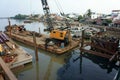 Asia worker, construction site, water, scaffold Royalty Free Stock Photo