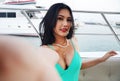 Asia young woman smile portrait selfie photo traveling on speed boat in summer for relaxation at Thailand. Royalty Free Stock Photo