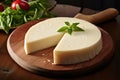 Asiago Cheese Platter on Wooden Plate. AI Generated Royalty Free Stock Photo