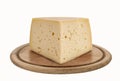 Asiago, Italian cheese on wooden plate Royalty Free Stock Photo