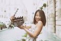 Asian actress smiling with clapper board