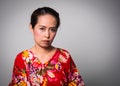 Asian adult woman straight face on white background