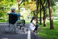 Asian Adult Woman Touchy And Angry Acting With Elderly People In Wheelchair After Senior Mother Argument,argue With Daughter In