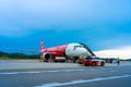 A322 Asian airline passenger plane boarding passengers stairway. At the airport on the island of Langkawi Royalty Free Stock Photo