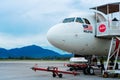 A322 Asian airline passenger plane boarding passengers stairway. At the airport on the island of Langkawi Royalty Free Stock Photo