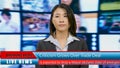 Asian American anchorwoman with lower thirds