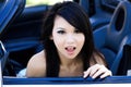 Asian American Woman Sitting In Car Bare Shoulder Portrait