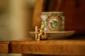 Asian antique stillife with ivory netsuke and tea cup