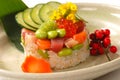 Asian appetizer of rice with tuna, and salmon