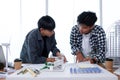 Asian Architect Students Studying Modern House Design and Finding Ways to Utilize Natural Alternative Energy or Use Natural