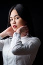 Asian young woman in white over black background. Black and Whit Royalty Free Stock Photo