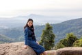 Asian attractive young woman traveler tourist standing  looking at mountain valley nature landscape summer scenery feeling Royalty Free Stock Photo