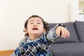 Asian baby boy feeling upset Royalty Free Stock Photo