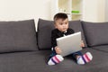 Asian baby boy holding tablet Royalty Free Stock Photo