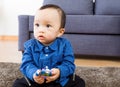 Asian baby boy playing toy Royalty Free Stock Photo