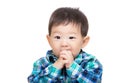 Asian baby boy suck finger Royalty Free Stock Photo