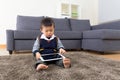 Asian baby boy using tablet Royalty Free Stock Photo
