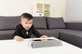 Asian baby boy watching on tablet Royalty Free Stock Photo