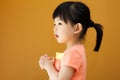 Asian baby child girl is praying